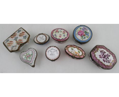 Eight 19th century and later Bilston enamel or porcelain patch boxes, of various sizes and designs