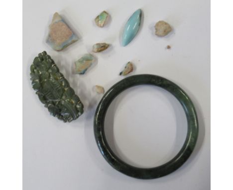 A Jadeite bangle, diameter 3ins, together with a jade type brooch and a quantity of boulder opal samples etc.&nbsp;