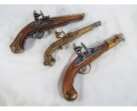 Three replica pistols to include an all metal Steampunk Scottish Pistol Replica by Murdoch Of Dowane a tin barrel Saint-Etien