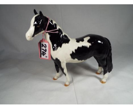 Beswick Pottery - a Pinto Pony model.1373, second version, piebald, gloss,  approx 16.5 cm high - Est £40 - £60