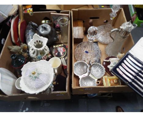 Two boxes containing a good mixed lot to include ceramics, good quality glass decanters, to include a ship's lead crystal dec
