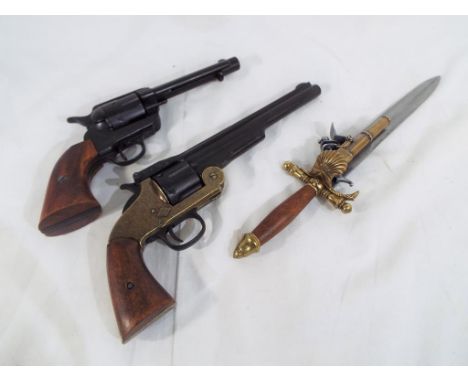 Two replica pistols to include a Schofield Model 1875 Single Action Break-Top Revolver, a 45 Colt and a flintlock dagger gun
