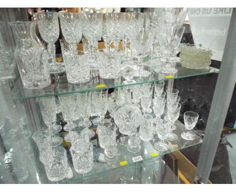 Thirty eight pieces of glassware to include decanter, vases, glasses and similar