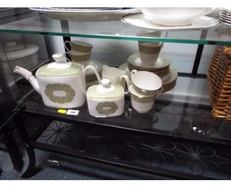 A Royal Doulton tea service decorated in the Sonnet pattern, six place setting comprising 30 pieces and a wicker picnic baske