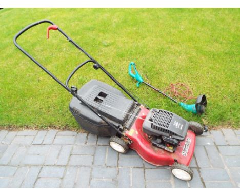 A Mountfield petrol lawn mower model HP470 also included in the lot is a garden strimmer also included in the lot is a wet wh