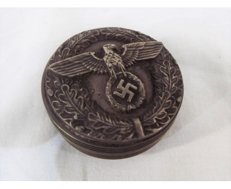 A screw release table snuff box displaying German swastika. Estimate £30 - £50