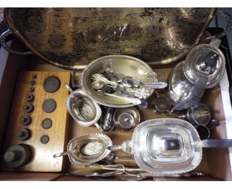 A good lot to include a quantity of plated ware to include a tea services, tray, a quantity of spoons, a table lighter also i