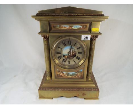 A good brass cased mantel clock, the architectural case inset with painted panels showing classical series, matching painting