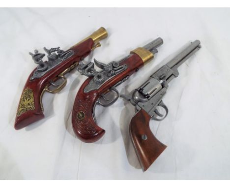 Three replica pistols to include two Spanish flintlocks and a Colt army percussion pistol