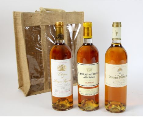 3 bottles of Sauternes wine to include: Chateau Lafuurie-Payraguey 2003 vintage. Chateau de Fargues 2003 vintage, Chateau Ray