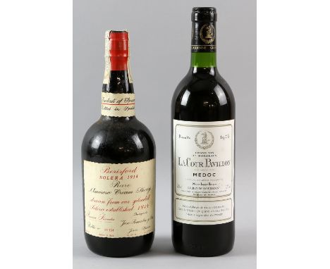 1 bottle of Berisford Solera 1914 Rare Amoroso Cream Sherry, bottle NO.65194. 0.72 Lts; 1 bottle of 1976 vintage Lacour Pavil