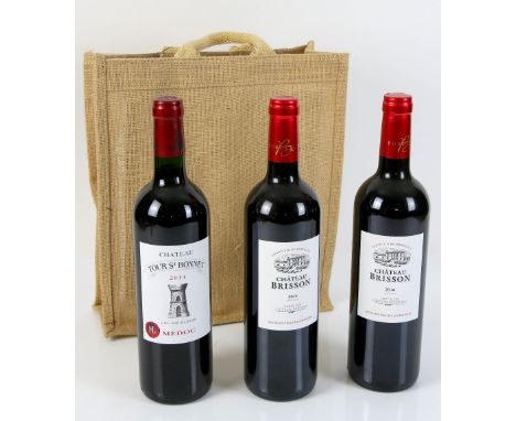 3 bottles of red wine to include: 1 bottle of Chateau Tour St. Bonnet Medoc 2014 vintage, 2 bottles of Chateau Brisson 2014 v