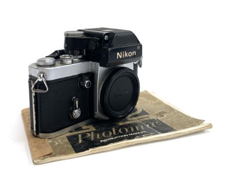 A Nikon F2 Photomic 35mm camera with manual, serial number 7405306 