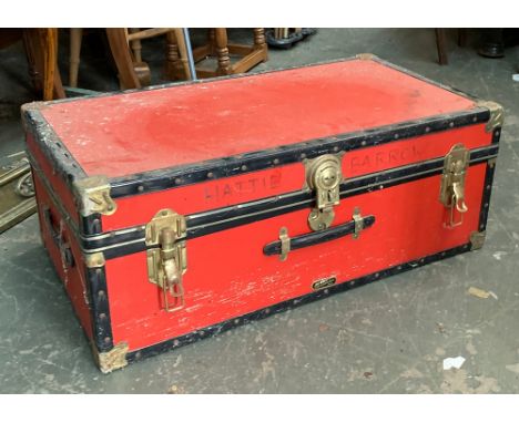 A red travel trunk, marked Hattie Barrow, 83cmW 