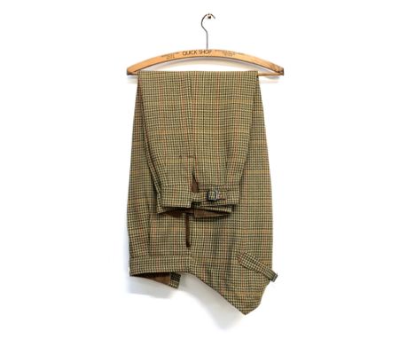 A pair of Cordings gent's tweed shooting breeks with buckle fastenings, pleated tunnel tops and button fly, 38" waist 