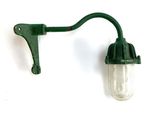 A vintage outdoor corner light fitting, cast iron with glass cloche, 44cmL 