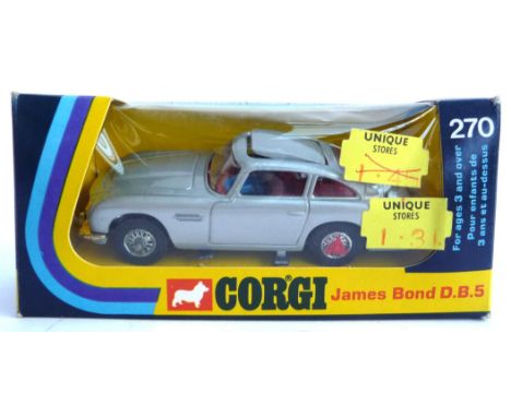 A James Bond Corgi DB5 270 Die-cast scale model with ejector seat, bullet screen, telescopic over-riders, retractable machine