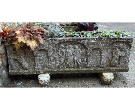 A large composite stone trough planter, raised on stone supports, 118x26x35cmH 