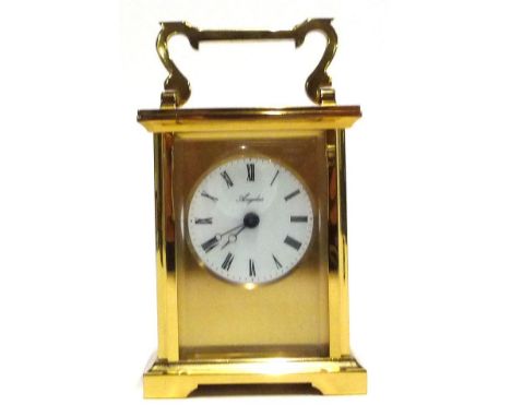 An Angelus brass carriage clock with bevelled glass front, quartz movement, 14cmH 