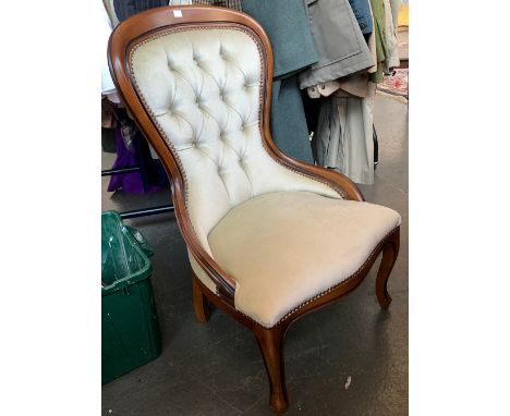 A modern button back bedroom chair 