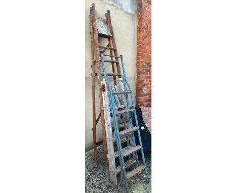 A vintage wooden folding step ladder, together with two others 