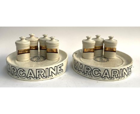 A pair of ceramic margarine stands by Parnall &amp; Sons, 21-22 Narrow Wine Street, Bristol, 31cmD (af), together with a set 