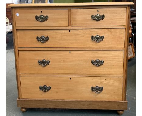 A light oak chest two short over three long drawers, on plinth base and turned feet, 107x46x107cmH 