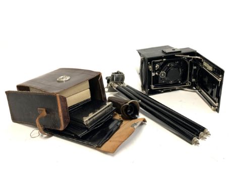 A Zeiss Ikon Compur Ideal 225 5x4 plate camera with fitted Tessar 1:4.5; F=13.5 lens; no 693077, light meter and leather case