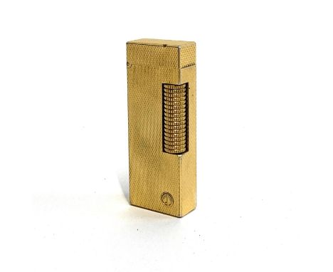 An engine turned gold plated Dunhill lighter 