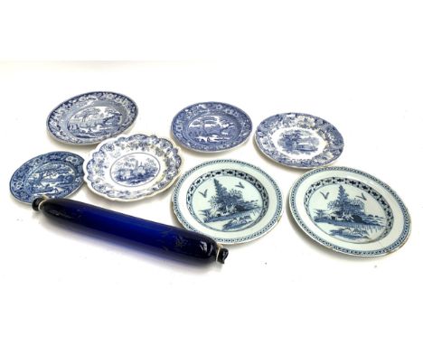 A Bristol blue glass rolling pin, 39cmW, Canton views opaque china plate, a pair of 19th century blue and white plates, etc 