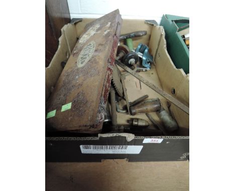 A selection of garage tools including socket set