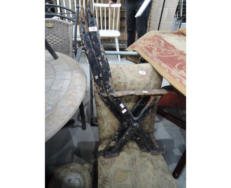 A pair of cast iron bench ends
