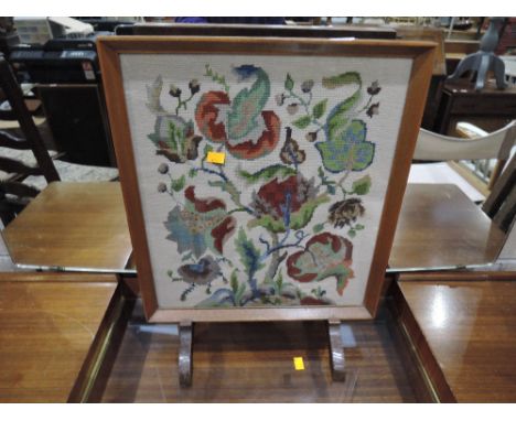 A tapestry firescreen