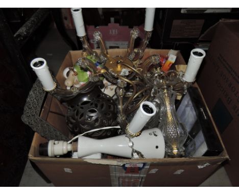 A box of decorative items including light fitting