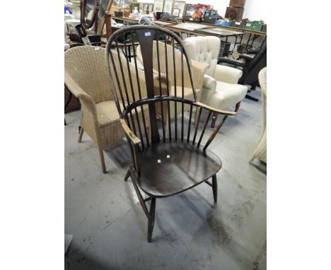 A vintage Ercol dark stained Windsor style chair
