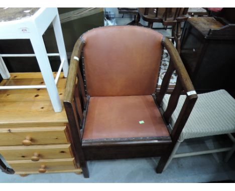 An early to mid 20th Century stained frame commode