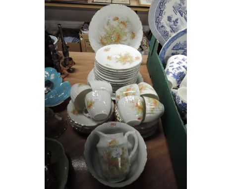 A part tea service unmarked with enamel decoration