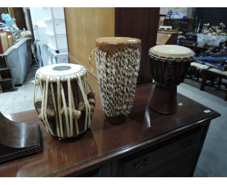 Three African bongo style drums