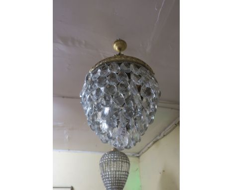 A CONTINENTAL GILT BRASS AND CUT GLASS CENTRE LIGHT.