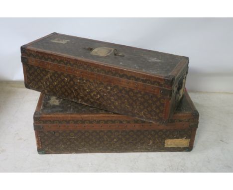 A PAIR OF  LOUIS VUITTON LEATHER  TOOLED TRUNK CASE, of rectangular form with brass strapwork and lock plates lined interior 