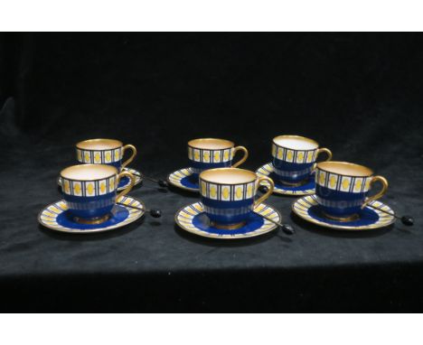 AN EARLY 20TH CENTURY ROYAL WORCESTER SET OF SIX COFFEE CUPS AND SAUCERS, on blue ground with painted yellow ovals within whi