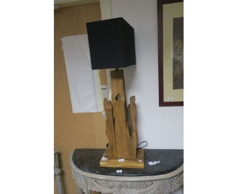 A CONTEMPORARY TABLE LAMP, in the form of driftwood with a rectangular black shade 93cms high