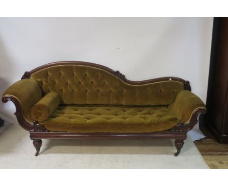 A 19TH CENTURY MAHOGANY SCROLL END SOFA, by Williams & Gibton Dublin, the mahogany foliate carved frame with a gold velvet bu