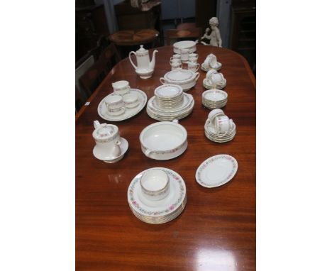 A PORCELAIN PART DINNER AND TEA SERVICE, by Paragon, 20th century, the white ground decorated with a foliate border comprisin