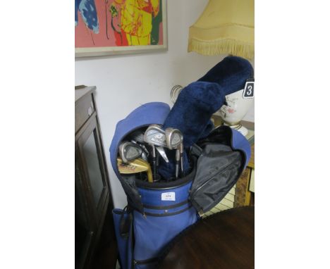 A SET OF GOLF CLUBS AND BAG, comprising nine Wilson Ultra MBT Irons;  a Wilson Ultra 3wood and 5wood;  A Dunlop DDH Lob Wedge