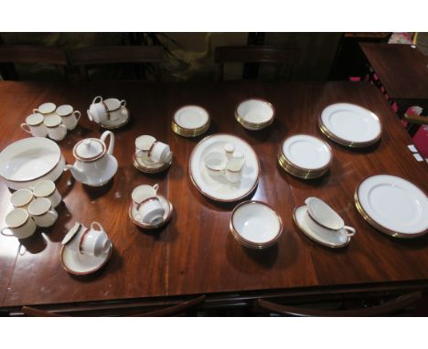 A ROYAL ALBERT BONE CHINA TEA AND DINNER SERVICE, ROYAL HOLYROOD PATTERN the white ground decorated with a wine border with f