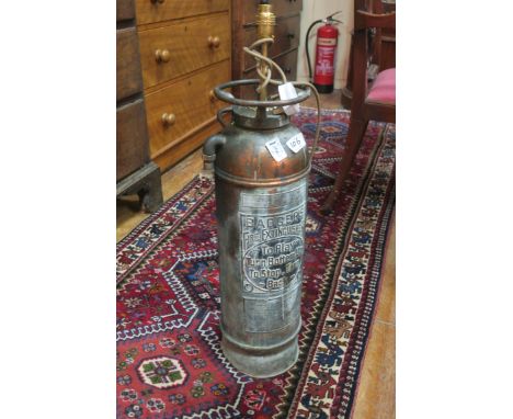 A COPPER LIGHT, in the form of a fire extingusher