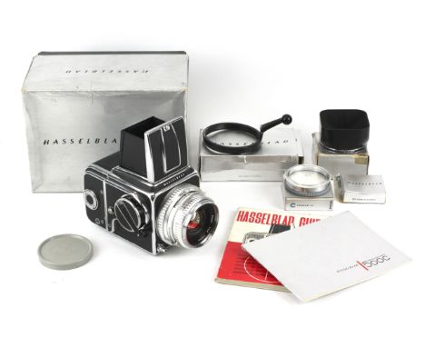 A Hasselblad 500c 6x6 medium format SLR camera, chrome, 1968. Serial Number TR 79064. With a Carl Zeiss 80mm f2.8 Planar lens