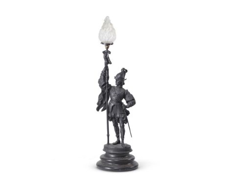 A CONTINENTAL SPELTER LAMP IN THE FORM OF A 17TH CENTURY MAN AT ARMS20TH CENTURYWith frosted flambe shade above the soldierTh