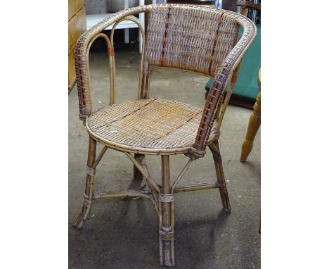 A Vintage French wicker conservatory chair 